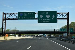 Exit 8 leaves the Inner Roadway at the CR 571 (Etra Perrineville Road) overpass for Route 133 to Route 33. Route 33 follows Franklin Street, Main Street and Mercer Street west through Hightstown to an overlap with U.S. 130 southwest to Robbinsville.