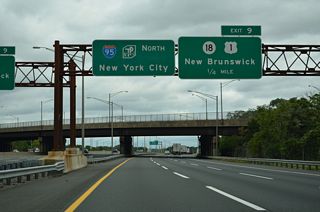 Exit 9 departs from both the Inner and Outer Roadways of the New Jersey Turnpike beyond the Route 18 overpass.