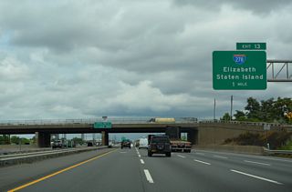 One mile south of Exit 13 on the Turnpike Outer Roadway. East from I-95, Interstate 278 crosses the tolled Goethals Bridge onto the Staten Island Expressway at Staten Island, New York.