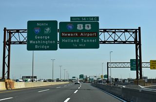 Interstate 78 travels east across the Newark Bay into Bayonne and then north into Jersey City. The Newark Bay Extension concludes at the three block long couplet of 12th/14th Streets preceding the Holland Tunnel to Lower Manhattan in New York.