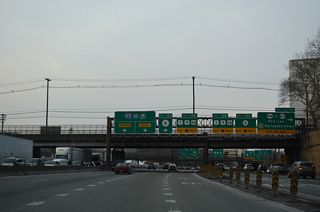 Exit 73-74 from the Lower Level roadway connects with Bridge Plaza at U.S. 9W (Fletcher Avenue). U.S. 9W arcs northeast to a parclo interchange with Route 67 (Lemoine Avenue) and ramps to the Palisades Interstate Parkway.