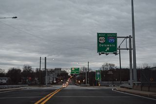 U.S. 130 commences north along Broadway from the end of Route 49 and cloverleaf interchange with I-295/U.S. 40 east of the Delaware Memorial Bridge.
