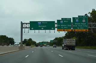 Interstate 80 travels east through Totowa, Paterson and Hackensack to I-95 ahead of Fort Lee and the George Washington Bridge into New York. I-280 partitions from I-80 nearby on a southward course to The Oranges and Newark.