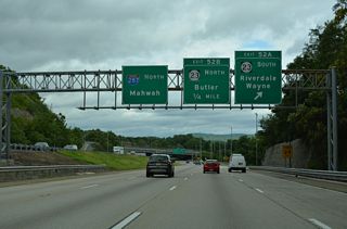 Entering the directional cloverleaf interchange (Exits 52 A/B) with New Jersey Route 23 on I-287 north.
