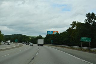 14 miles remain along Interstate 287 northbound to the exchange with I-87 (New York State Thruway) at Suffern.