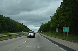 This sign alerts northbound motorists of the New York state line in 4.5 miles. A similar sign is posted along I-78 west for the Pennsylvania state line.