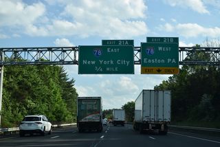 The entrance ramp from U.S. 202/206 south adds an auxiliary lane to the directional cloverleaf interchange (Exits 21 B/A) with Interstate 78.
