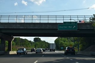 Exit 33 loops onto Harter Road ahead of the Morris / Harding Township line.