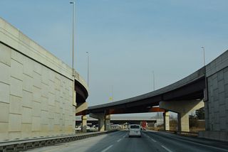 A directional T interchange joins the New Jersey Turnpike and Pearl Harbor Memorial Extension.