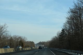 Crossing Oldmans Creek, the Turnpike northbound enters Gloucester County.