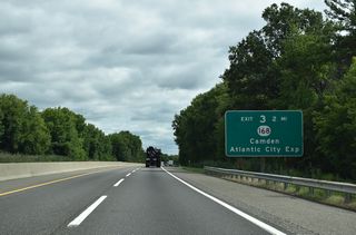 The Turnpike advances northeast into urban areas in Camden County ahead of Exit 3 for Route 168 (Black Horse Pike) at Runnemede. Route 168 links the toll road with Route 42 (North South Freeway) south to the Atlantic City Expressway in Gloucester Township.