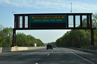 The New Jersey Turnpike expands to four roadways in Mansfield Township. Trucks and buses are restricted to the outer roadways.