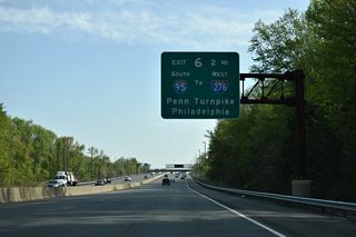 The Pearl Harbor Memorial Turnpike Extension joins the New Jersey Turnpike at Exit 6 with the Pennsylvania Turnpike. Interstate 95 was realigned onto the Extension in 2018.