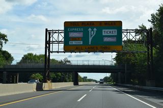 The Exit 1 Toll Plaza lies two miles beyond the parclo interchange joining U.S. 40 and Route 140 with The New Jersey Turnpike.
