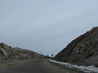 Leading away from U.S. 95, U.S. 6 (Grand Army of the Republic Highway) arcs northeast between Golden Mountain and Rushton Hill.
