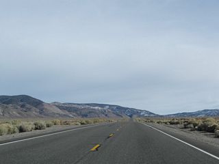 U.S. 6 (Grand Army of the Republic Highway) extends northeast across Queen Valley toward Montgomery Pass. Sagebrush populates the arid landscape.