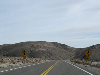 Curving southward through an S-curve, U.S. 6 traverses northern reaches of the Volcanic Hills.