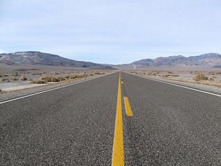 This pavement-level view shows the U.S. 6 highway looking west.