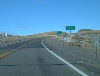 Continuing west, U.S. 6 crosses the Esmeralda-Mineral County Line. Note the postmile equation, since they reset at the county line. Photo taken 1/20/02.