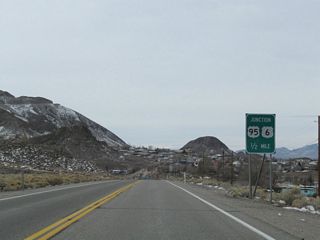 Some distance west, U.S. 6 approaches the town of Tonopah, the seat of Nye County. Tonopah, the Queen of the Silver Camps, sits at an elevation of 6,030 feet above sea level. Tonopah is unincorporated but was founded in 1900 and is the seat of Nye County. As of the 2000 Census, the population was 2,627 people and the town contains 16.2 square miles.