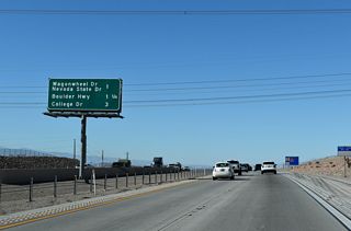 Wagon Wheel Drive west and Nevada State Drive east come together at a diamond interchange (Exit 17 A) with I-11/U.S. 93-95 in one mile.