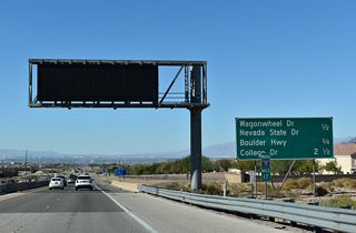 Interstate 11 north meets Boulder Highway (old SR 582) at a wye interchange (Exit 17 B) in 0.75 miles. Boulder Highway is the historic route of U.S. 93/95 through Henderson.