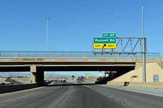 Russell Road continues west from I-11 through central Paradise to Paradise Road across from Terminal 1 at Harry Reid International Airport (LAS).