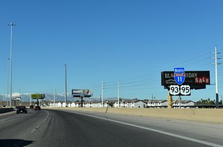 Paralleling Russell Road to the east, Interstate 11 north leaves the city of Henderson and enters the unincorporated town of Whitney.