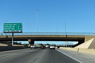 Nellis Boulevard spans I-11 one mile ahead of Exit 68 to Tropicana Avenue. Exit 69 to Flamingo Road follows in 2.25 miles while Boulder Highway meets the freeway in four miles at Exit 70.