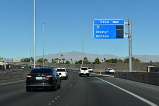 Travel time sign posted adjacent to the Charleston Boulevard northbound entrance ramp.