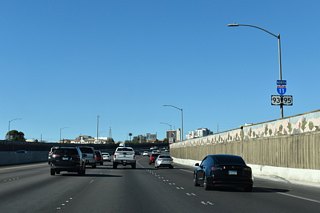 I-11/U.S. 93-95 turn northwest to parallel the Downtown Las Vegas street grid in advance of Las Vegas Boulevard at Exit 75.