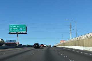 West from N 21st Street, I-11/U.S. 93-95 travel along an elevated roadway to Main Street just ahead of the Spaghetti Bowl interchange with I-15.