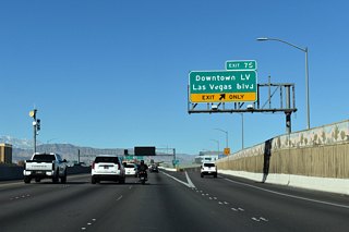 Las Vegas Boulevard leads south through Downtown en route to the Las Vegas Strip. The arterial also represents previous alignments of U.S. 91/466. Points of interest for Exit 75 include the Fremont Street and Arts Districts (including the Fremont Street Experience), as well as area museums.