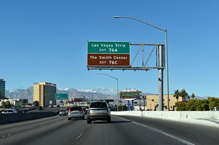 Interstate 15 lines the Las Vegas Strip to the south of Downtown while the Smith Center is located between the Spaghetti Bowl interchange and Main Street. 