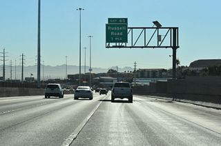 Russell Road extends east from Paradise to a diamond interchange (Exit 65) with I-11/U.S. 93-95.