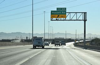 Russell Road leads west along a commercial and residential corridor to Paradise Road opposite Terminal A of Harry Reid International Airport (LAS). Eastward, Russell Road connects with Boulder Highway (SR 582).