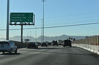 Flamingo Road joins the freeway at Exit 69 with Boulder Highway (SR 582) to the east and the center of the Las Vegas Strip to the west.