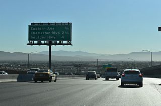 I-11/U.S. 93-95 curve south from Eastern Avenue ahead of Exit 72 to Charleston Boulevard (SR 159) and Exit 70 to Boulder Highway (SR 582).