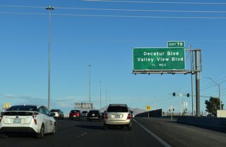 A collector distributor roadway separates from the I-11/U.S. 95 general travel lanes in 0.75 miles for exits to both Decatur Boulevard and Valley View Boulevard.