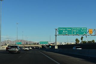 Separate ramps join I-11/U.S. 95 south with Decatur Boulevard. A parclo interchange follows with Valley View Boulevard by Meadows Business Center.