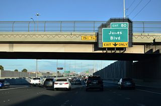 The parclo interchange (Exit 80) with Jones Boulevard follows the Torrey Pines Drive overpass on I-11/U.S. 95 southbound.
