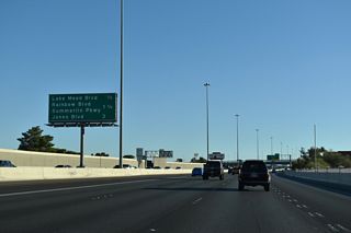 A six-ramp parclo interchange joins I-11/U.S. 95 with Rock Springs Drive, Lake Mead Boulevard, and Rainbow Boulevard at Exit 82.
