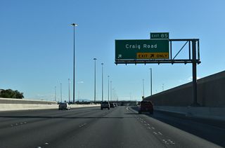 I-11/U.S. 95 south at the diamond interchange (Exit 85) with Craig Road and SR 573 east.
