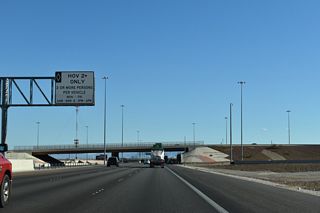 I-11/U.S. 95 south expand with an HOV lane leading into the Centennial Bowl interchange with Bruce Woodbury Beltway.