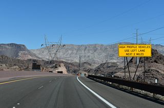 Certain vehicle types are advised to remain in the inner / left lane for the next two miles due to the possibility of strong cross winds across Black Canyon.