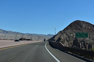 Named after a former governor (O' Callaghan) and former professional football player/military specialist (Tillman), the bridge rises 890 feet above the Colorado River. The concrete arch bridge also features a pedestrian walkway on the north side of the span.