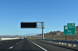 Completed by the end of 2018, a $58 million project redesigned Exit 64 from a diamond interchange into a DDI. Work also included improving a five mile stretch of U.S. 93 between I-15 and Apex Power Parkway (Akers, 2018).
