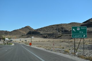 Exit 64 partitions with two lanes for U.S. 93 north through the DDI and a turn off for the adjacent regional landfill.