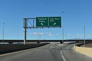 Work through the end of 2022 constructed a directional T interchange with the Las Vegas Beltway overlaying the original diamond interchange (Exit 52) with Tropical Parkway.