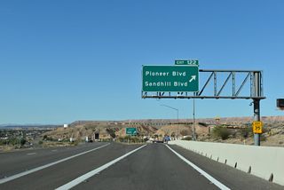 Sandhill Boulevard extends south from Exit 122 to W Mesquite Boulevard while Pioneer Boulevard runs parallel to I-15 west to Lower Flat Top Drive.